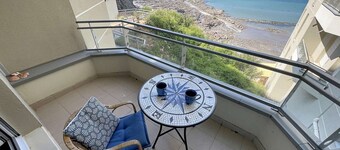 Central apartment with balcony, private parking