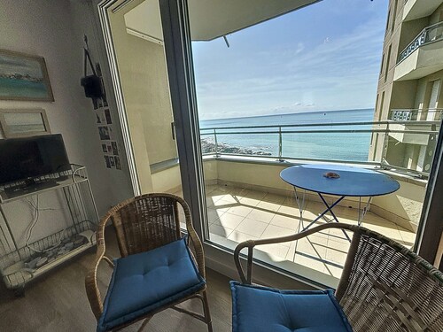 Appartement central avec balcon, parking privé