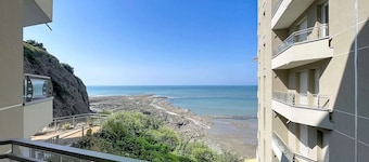 Central apartment with balcony, private parking