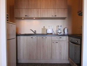 Refrigerador, microondas, parrilla de estufa y lavavajillas 