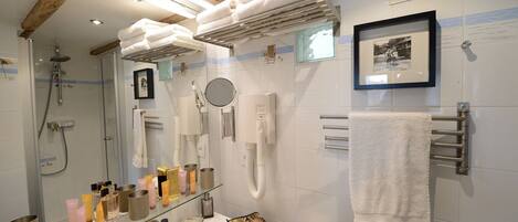 Shower, hair dryer, towels