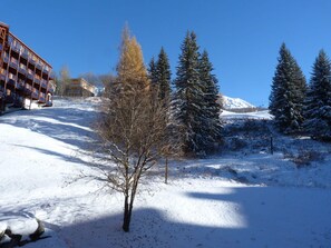 Experience the serene beauty of a winter wonderland from the comfort of this hotel's spacious balconies.