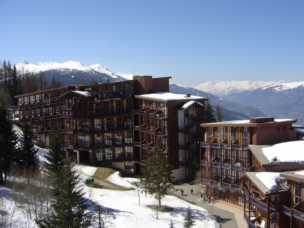 Experience the serene mountain views from the comfort of your room, with large windows and balconies offering breathtaking vistas.