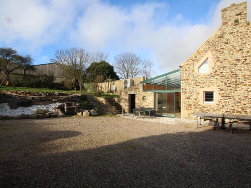 Cozy Cottage with Fireplace, Garden, and Game Room near the Sea