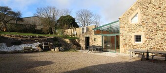 Cozy Cottage with Fireplace, Garden, and Game Room near the Sea