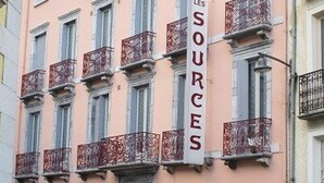 A building with multiple balconies and a sign reading "LES SOURCES". - T2 Apartment for 5 in Cauterets (Cauterets)