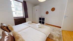 1 habitación, tabla de planchar con plancha, wifi gratis y ropa de cama 