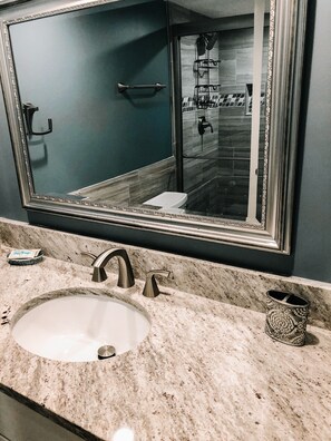 Combined shower/tub, hair dryer, towels, soap