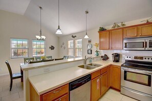 Fridge, microwave, oven, stovetop - This premier two-story beach home has 4 bedrooms, 3 baths, two living areas, sle (Port Aransas)