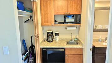 Fridge, microwave, stovetop, coffee/tea maker