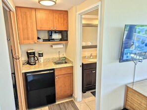 Fridge, microwave, stovetop, coffee/tea maker