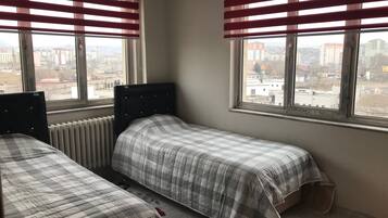 Basic Twin Room, 2 Bedrooms | 2 bedrooms, minibar, free WiFi, bed sheets