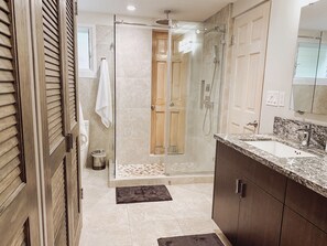 Shower, hair dryer, towels, soap