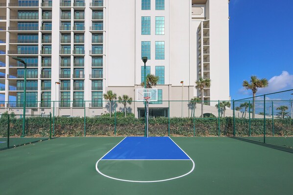 Play a game of basketball right by your rental, with a beautiful beachfront view just steps away at The Oasis
