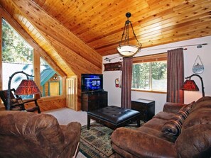 Flat-screen TV, fireplace, table football