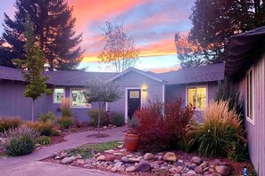 Twilight entrance to the peaceful riverfront home in Tumalo