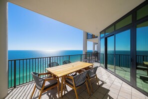 Outdoor dining - The Oasis at Orange Beach, formerly known as Phoenix West II, Unit 2310 (Orange Beach)