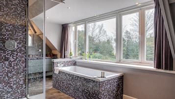 Superior Suite | 1 bedroom, premium bedding, free minibar, in-room safe