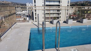 Outdoor pool, sun loungers