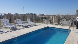 Outdoor pool, pool loungers