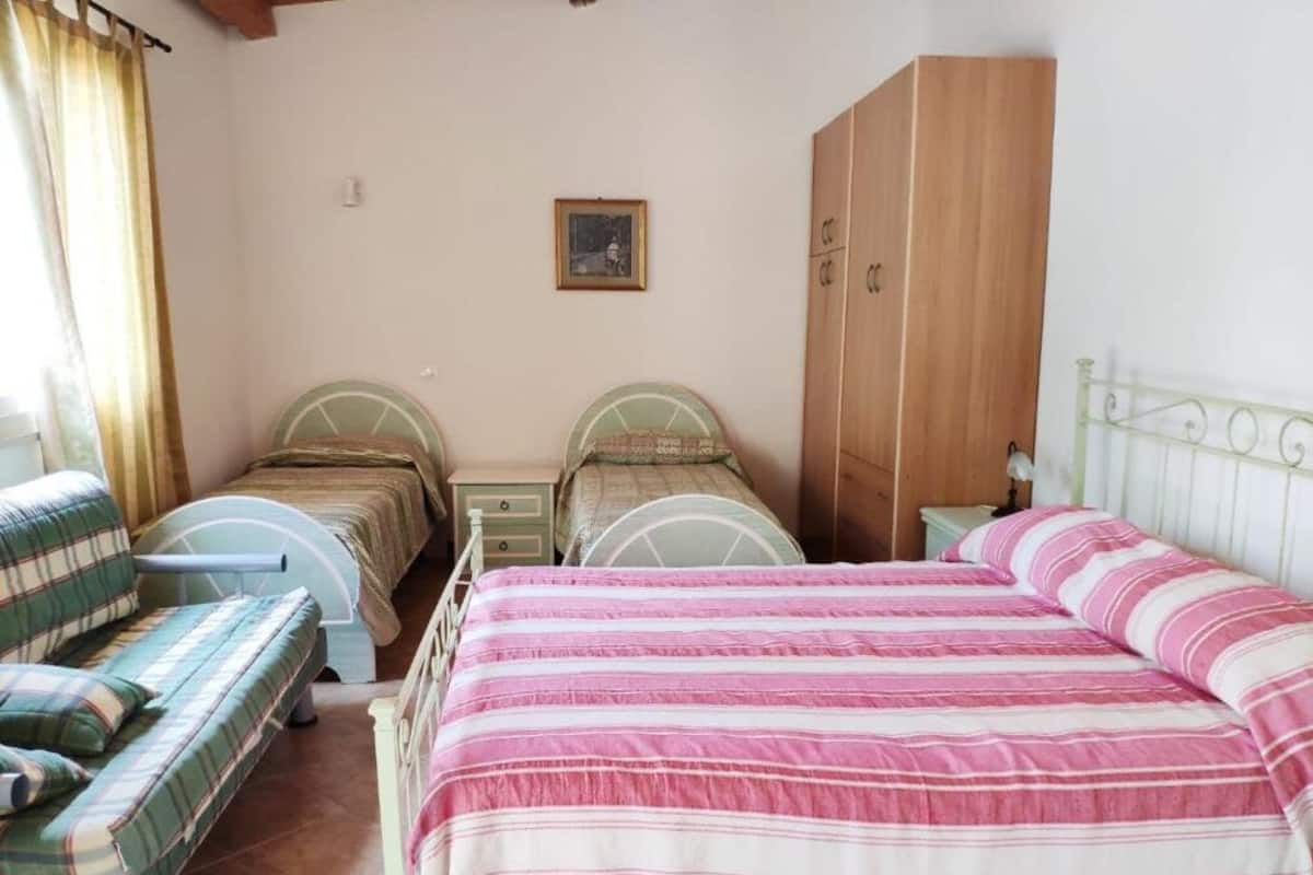 Basic Quadruple Room, Garden View | Desk, iron/ironing board, free WiFi, bed sheets