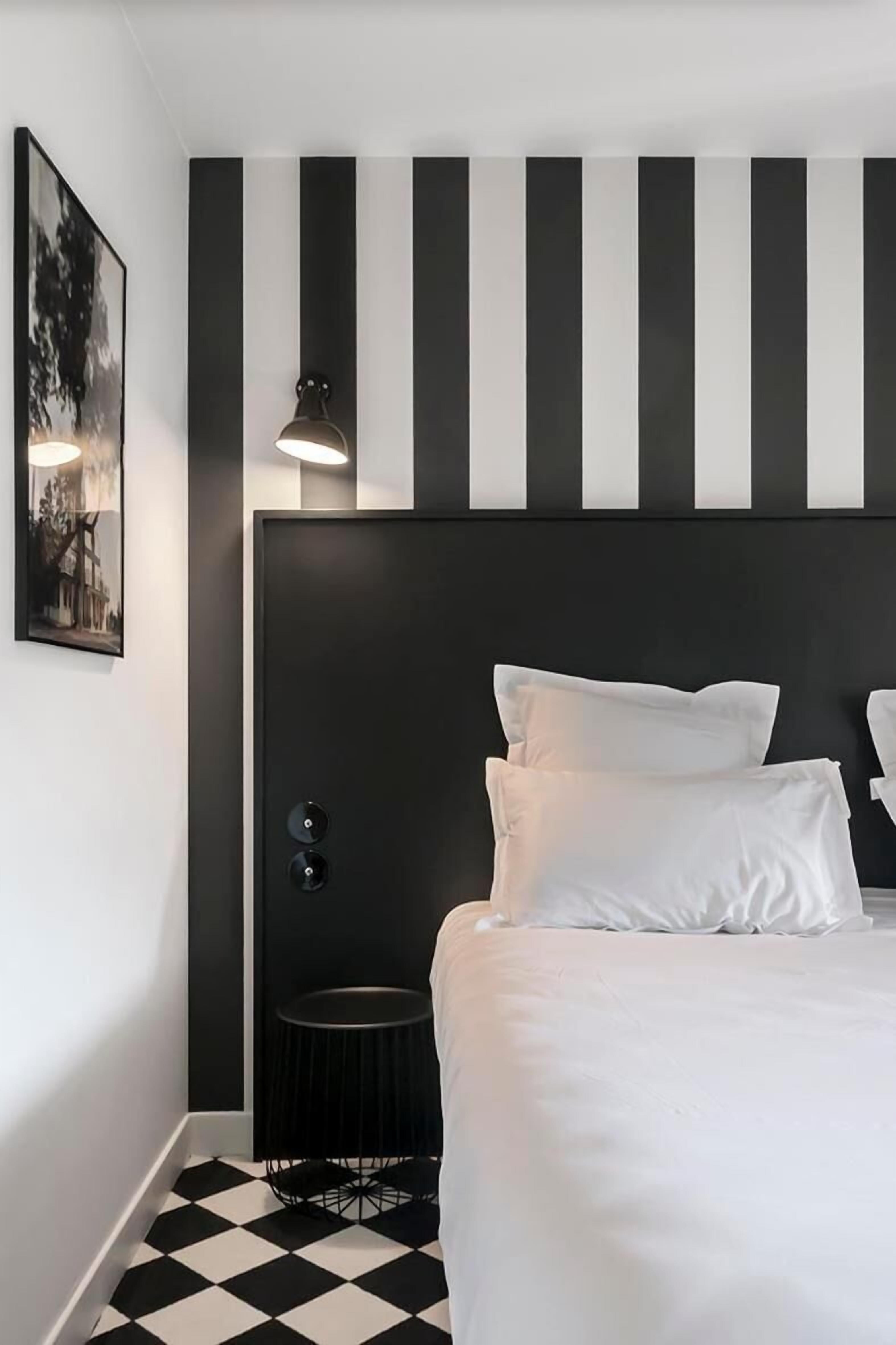 Premium bedding, desk, blackout drapes, soundproofing