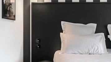 Premium bedding, desk, blackout drapes, soundproofing
