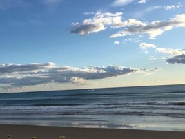 Private beach, white sand, sun loungers, beach umbrellas