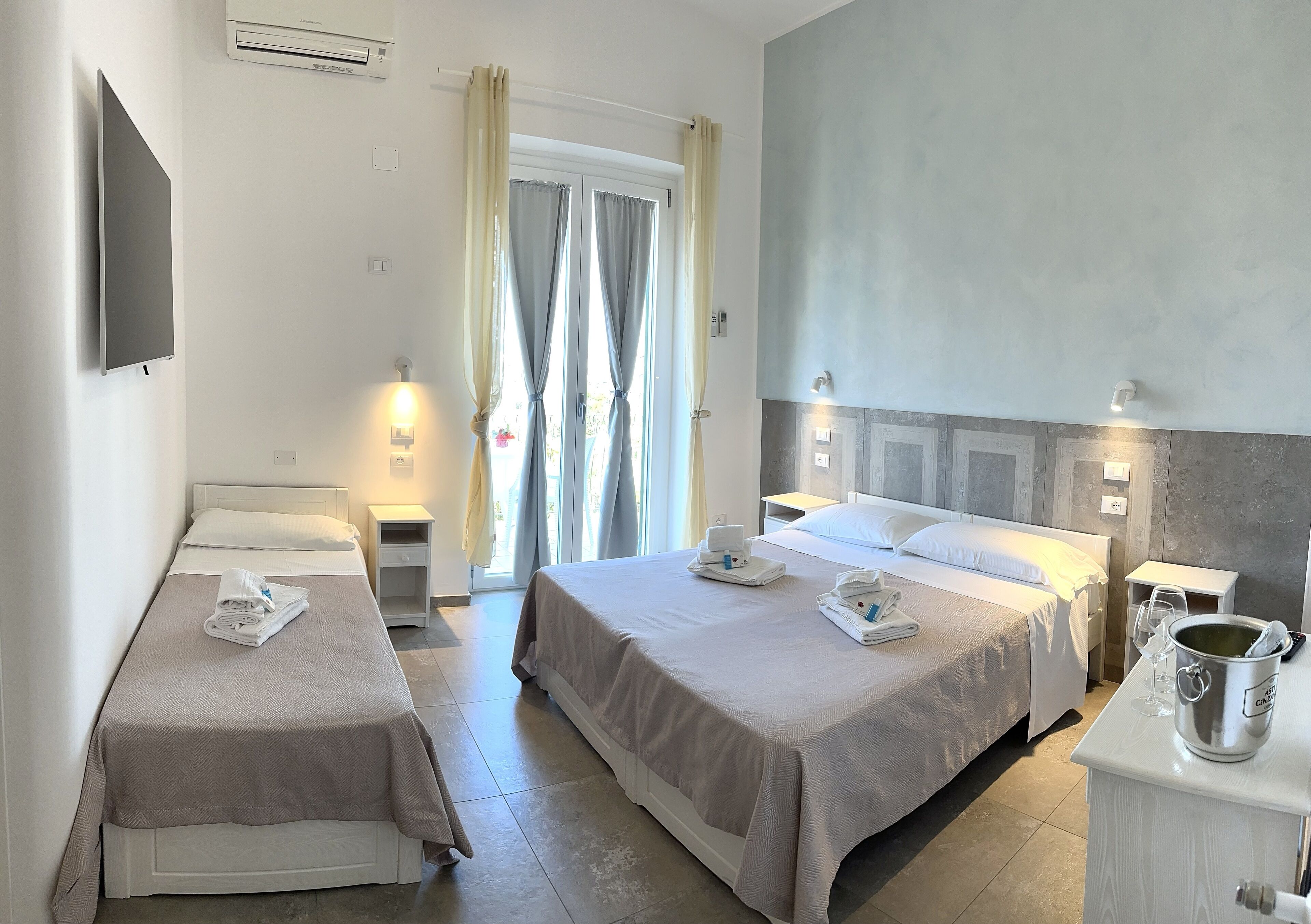 triple room, terrace, sea view | 1 bedroom, premium bedding, minibar, in-room safe