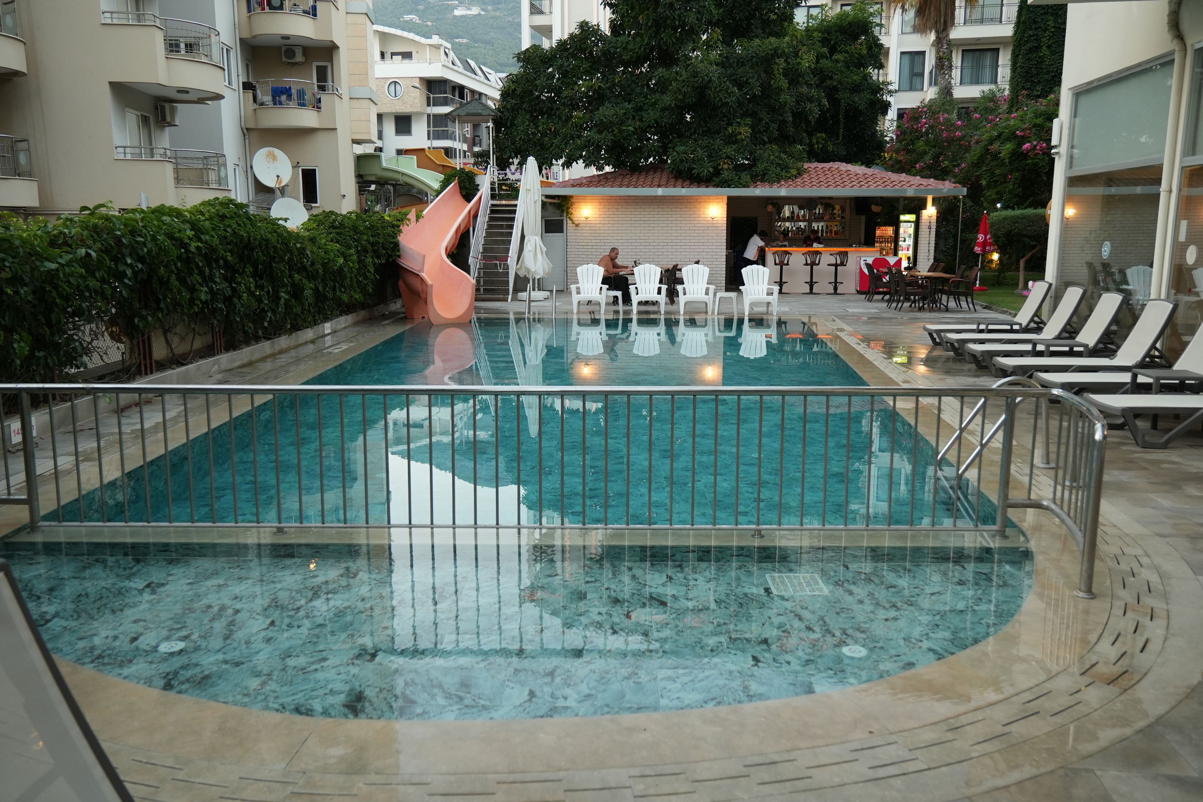 Outdoor pool, pool umbrellas, sun loungers