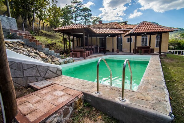 Outdoor pool, pool umbrellas, pool loungers