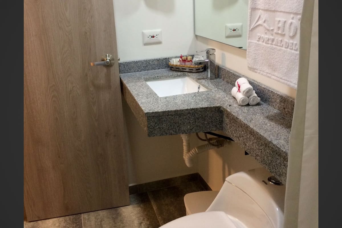 shower, free toiletries, bathrobes, towels