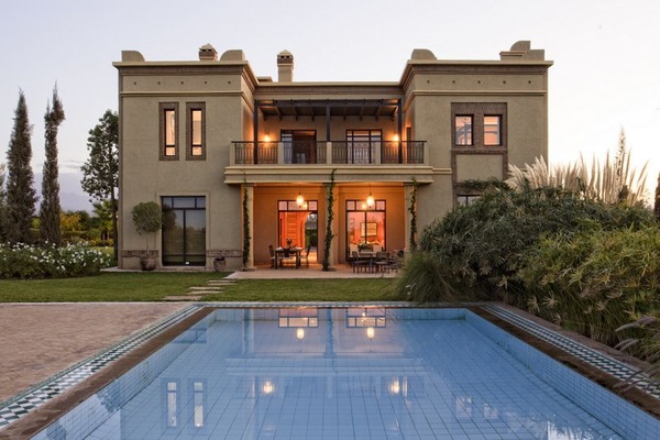 Outdoor pool, a heated pool, pool umbrellas, pool loungers