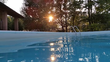 Seasonal outdoor pool, pool umbrellas, sun loungers