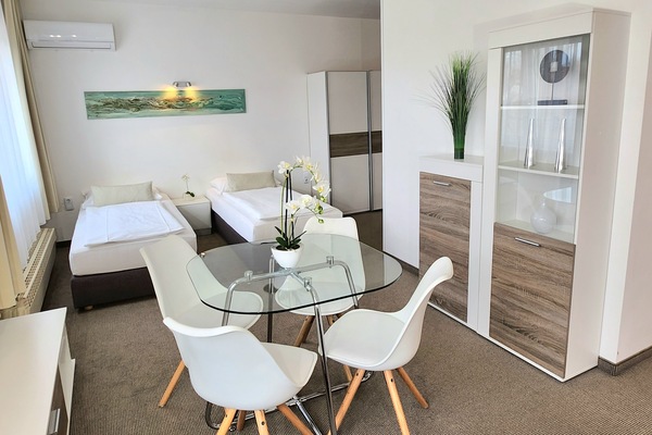 Quadruple Room | In-room safe, desk, blackout curtains, iron/ironing board