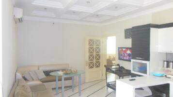 Flat-screen TV, fireplace