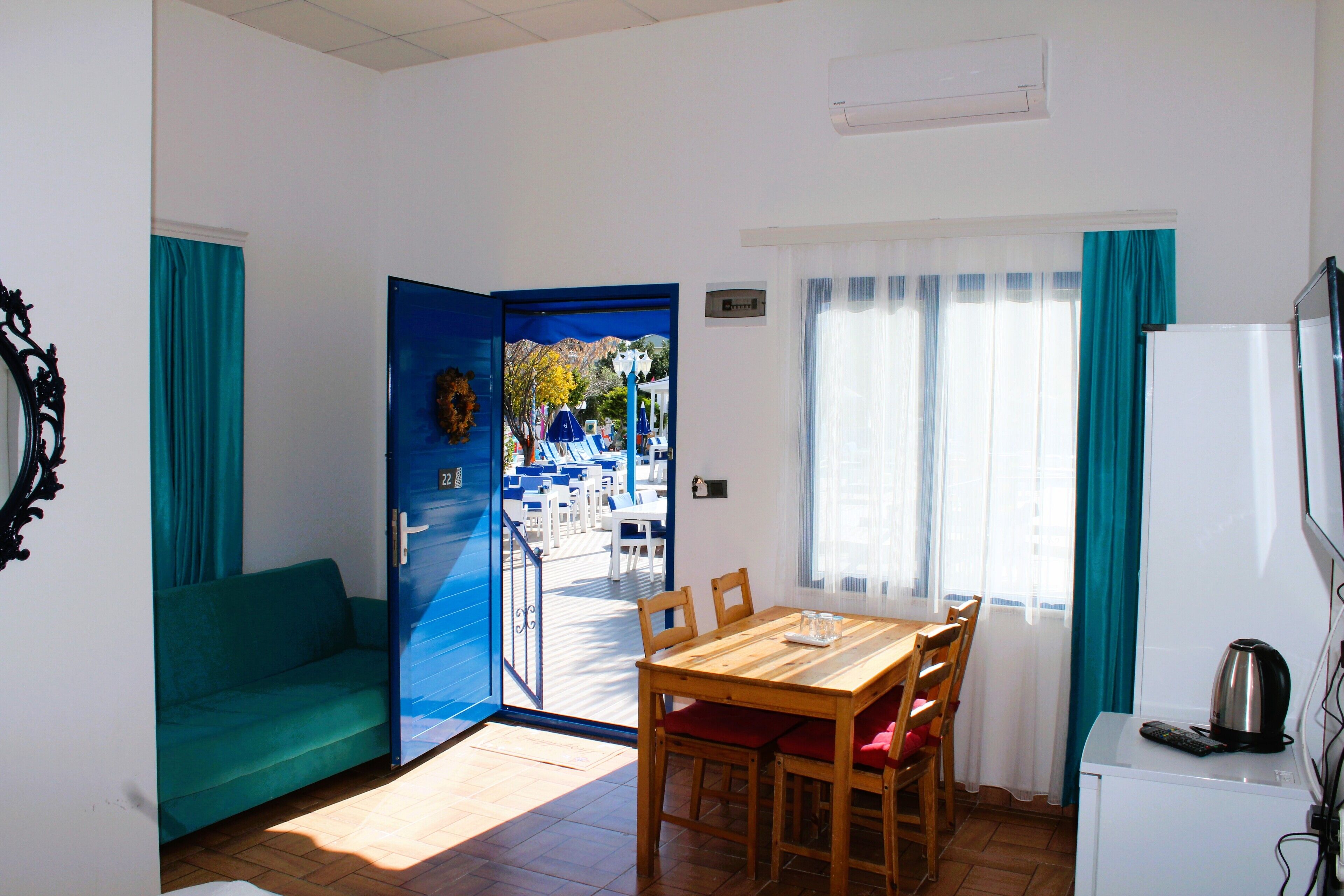 Economy Room, Patio, Garden View | Desk, laptop workspace, blackout drapes, soundproofing