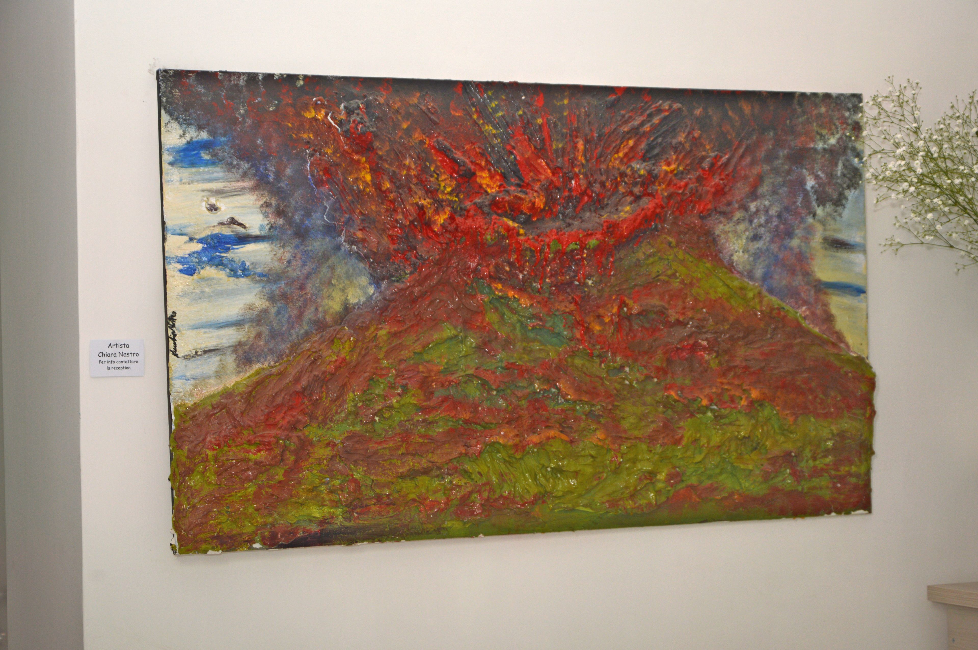 A large abstract painting on a wall.