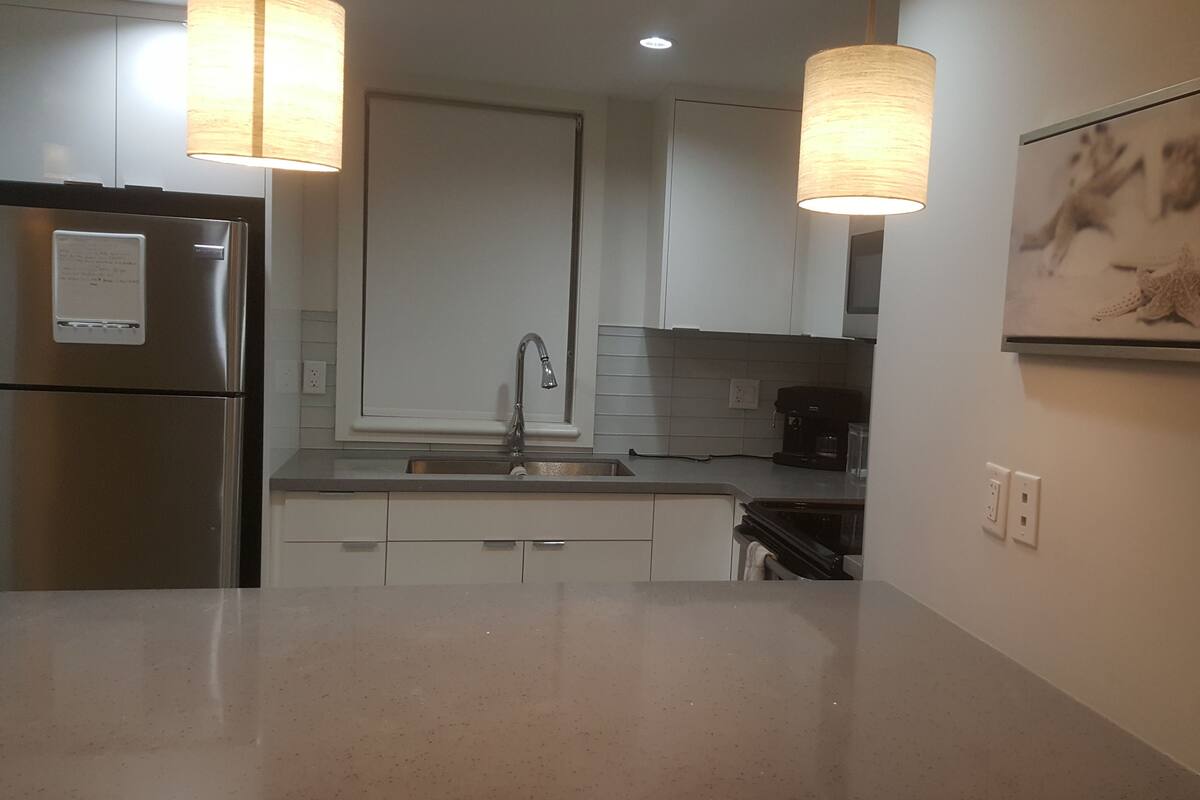 Condo, 2 Bedrooms, Balcony | Private kitchen | Coffee/tea maker, fridge, microwave, oven