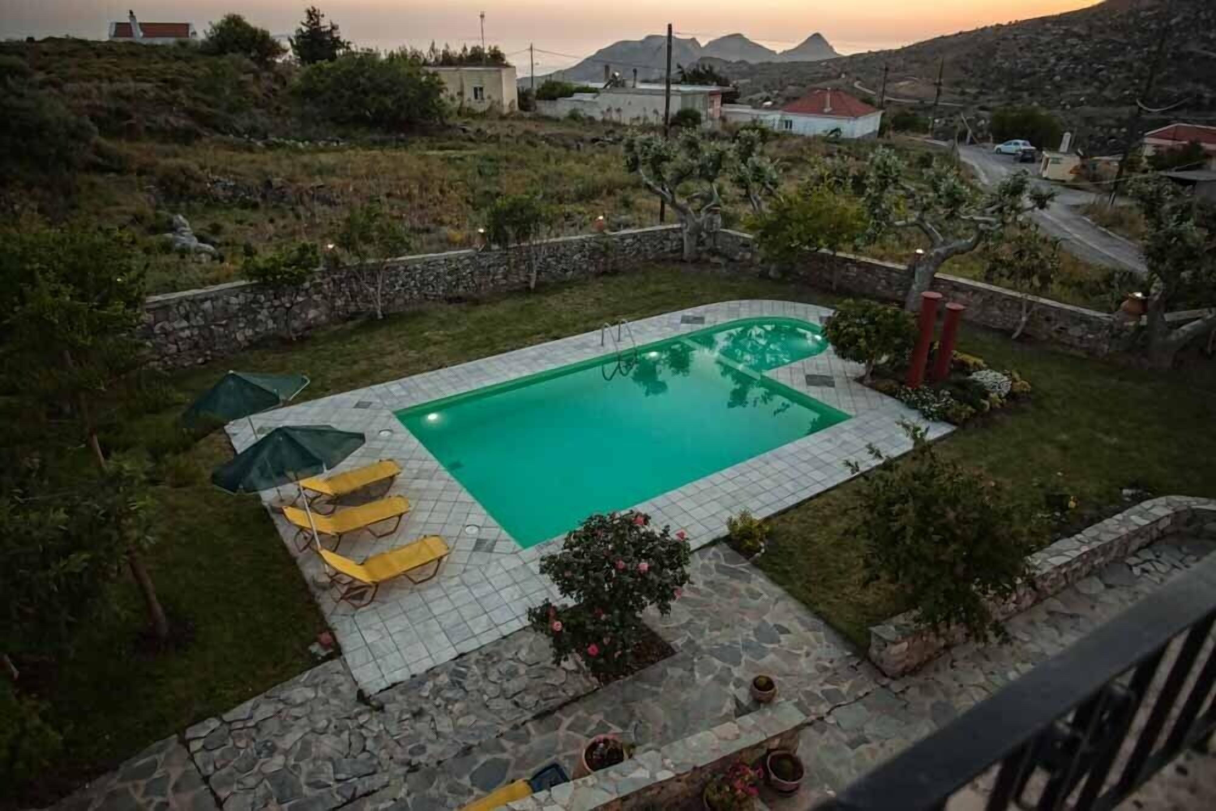 Outdoor pool, pool umbrellas, pool loungers