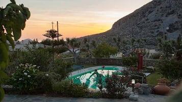 Outdoor pool, pool umbrellas, pool loungers