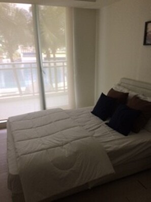 Room 210, 1 Bedroom | 1 bedroom, in-room safe, desk, iron/ironing board - Azure Positano by Mirabella (Parañaque)