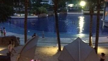 2 outdoor pools, open 7 AM to 7 PM, pool loungers