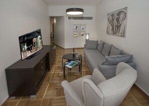 Appartement, 2 chambres | Coin séjour | Télévision à écran plat