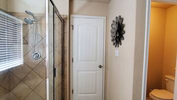 Shower, hair dryer, towels, soap