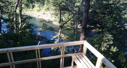 Wonderful rustic cabin, with native trees, with Rio Trancura, equipped