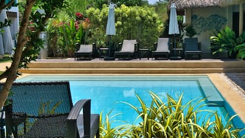 Outdoor pool, open 7 AM to 9:30 PM, pool umbrellas, sun loungers