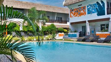 Outdoor pool, open 7 AM to 9:30 PM, pool umbrellas, pool loungers
