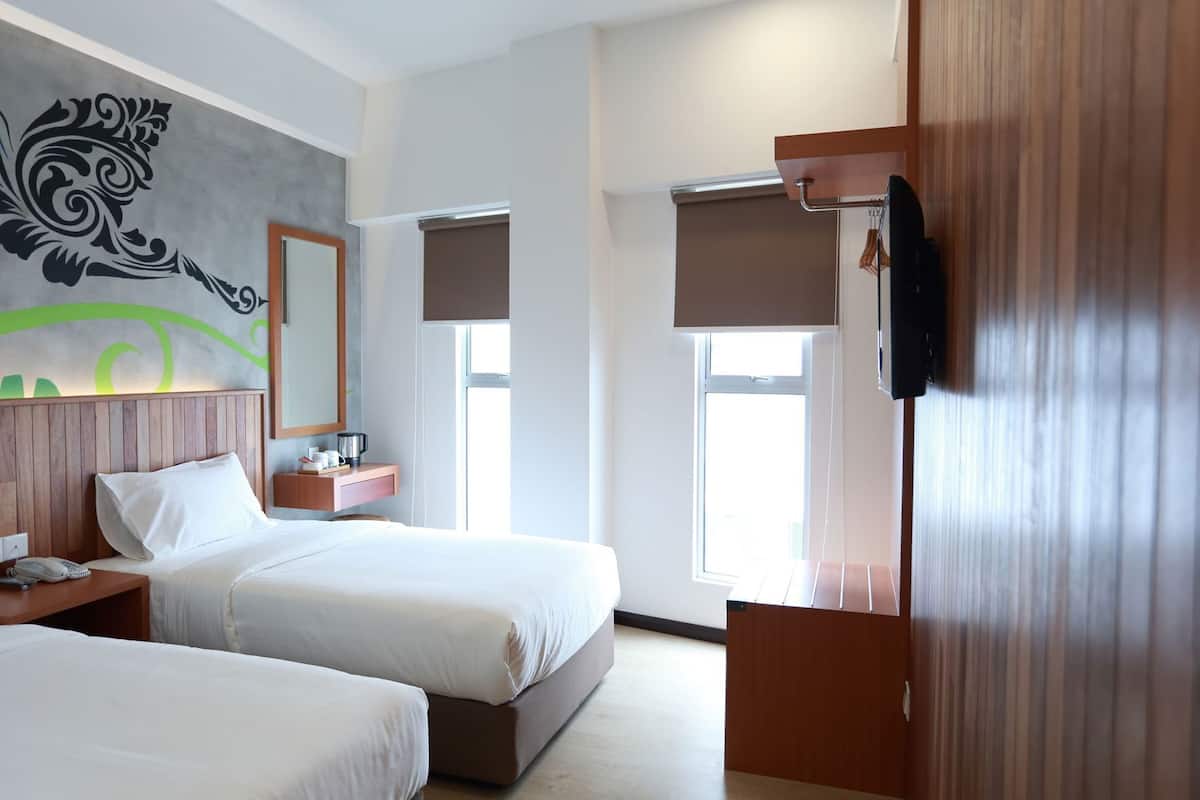 Ropa de cama de alta calidad y minibar