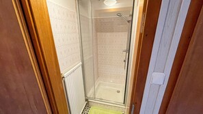 Shower, towels, toilet paper